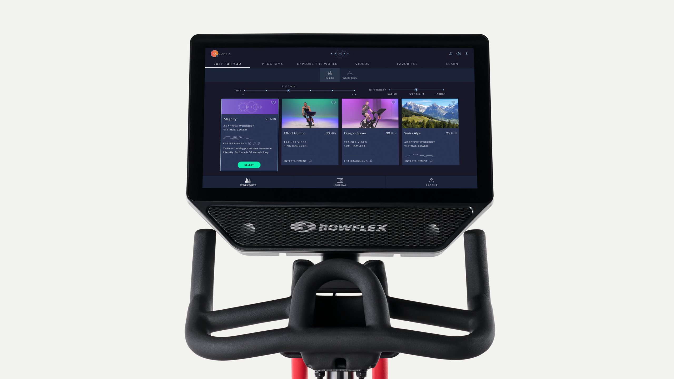 The VeloCore console: a 22 inch touchscreen above the handlebars showing class thumbnails