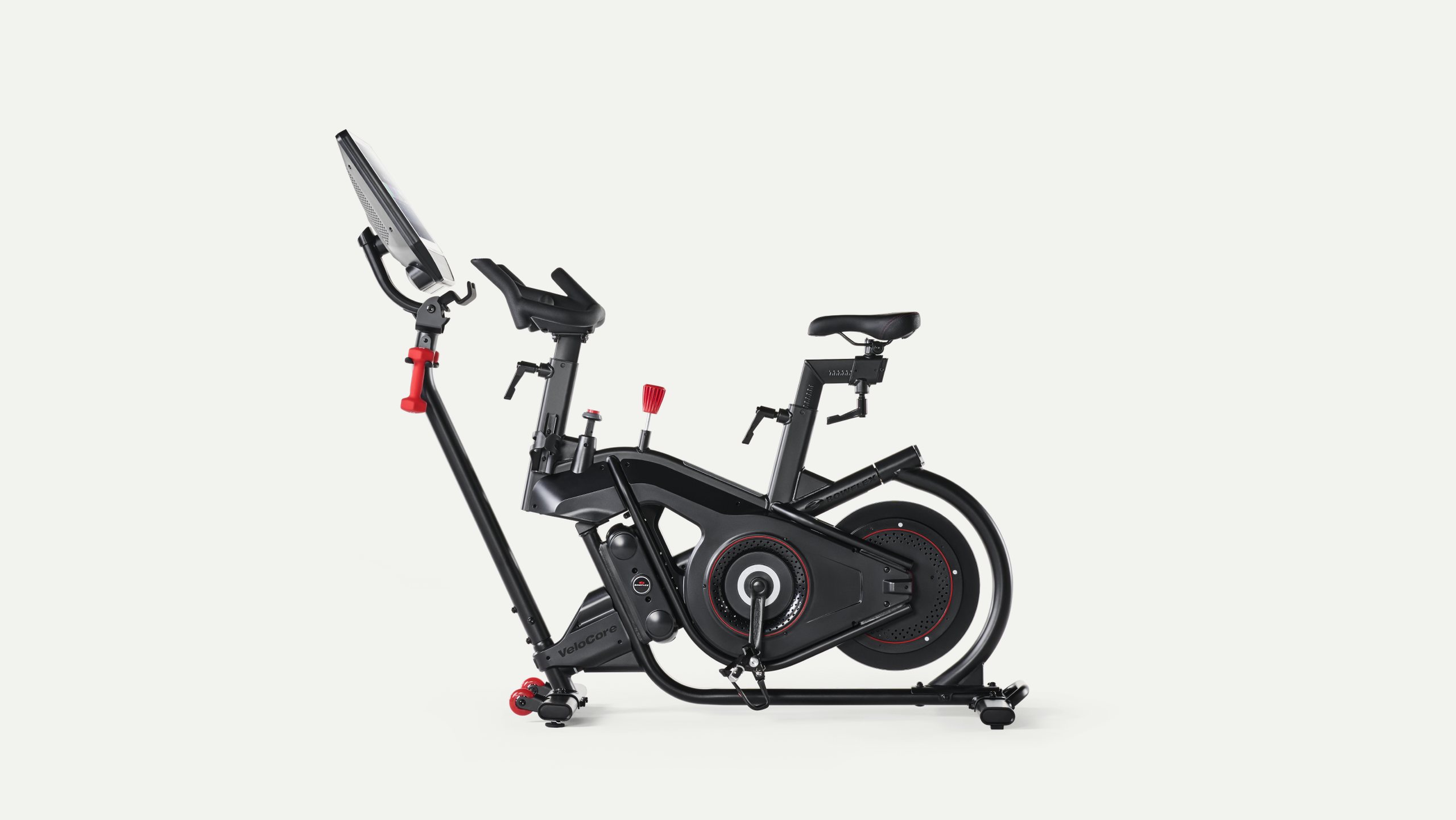 Side view of the VeloCore showing the frame, flywheel and the screen on its arm